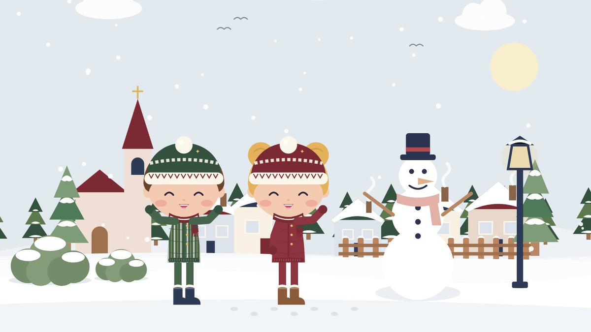 Winter activities for kids. Two children in winter clothes play in the snow by a snowman